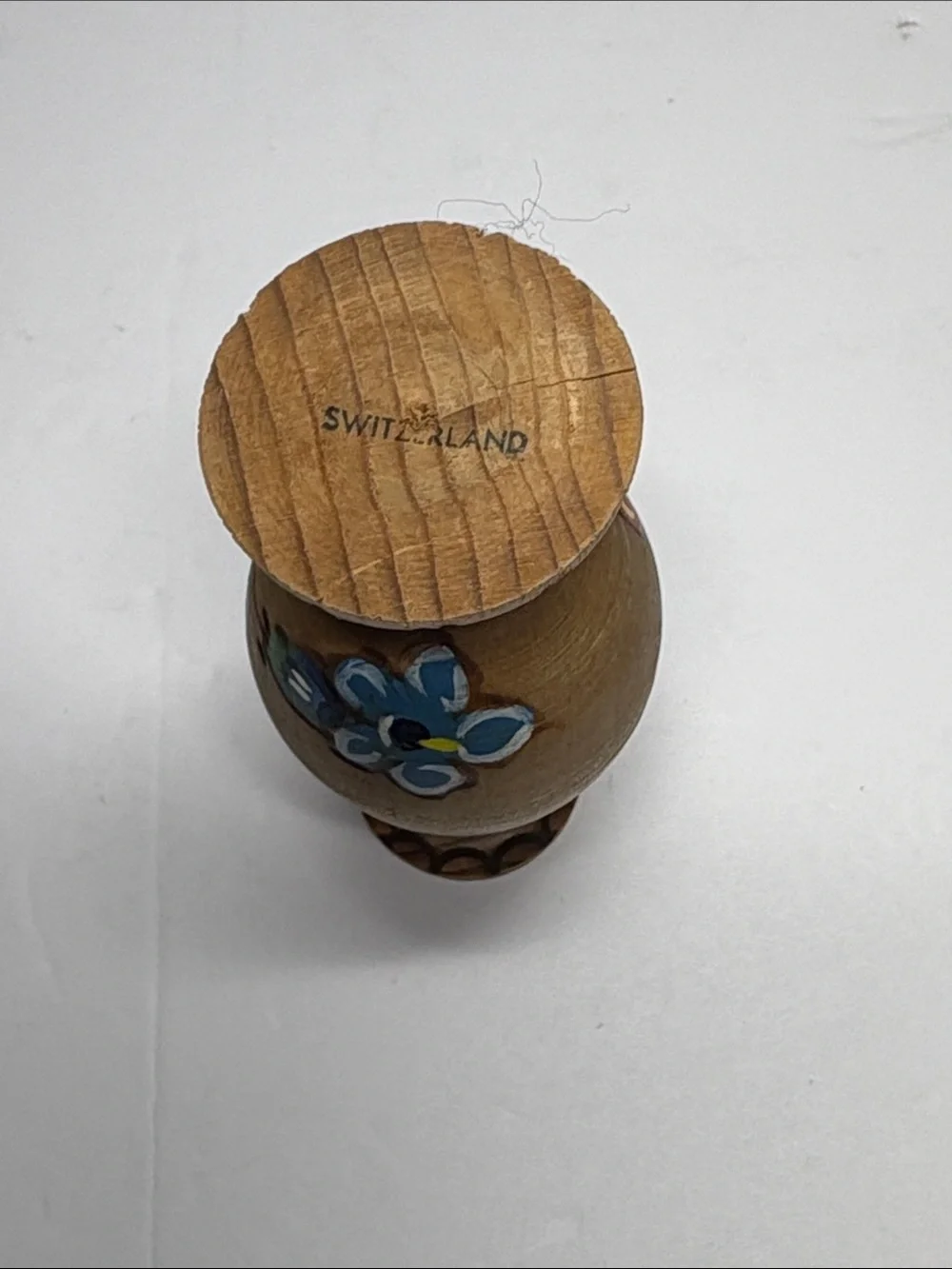 Handcrafted Wooden Egg Stand with Blue Floral Accent